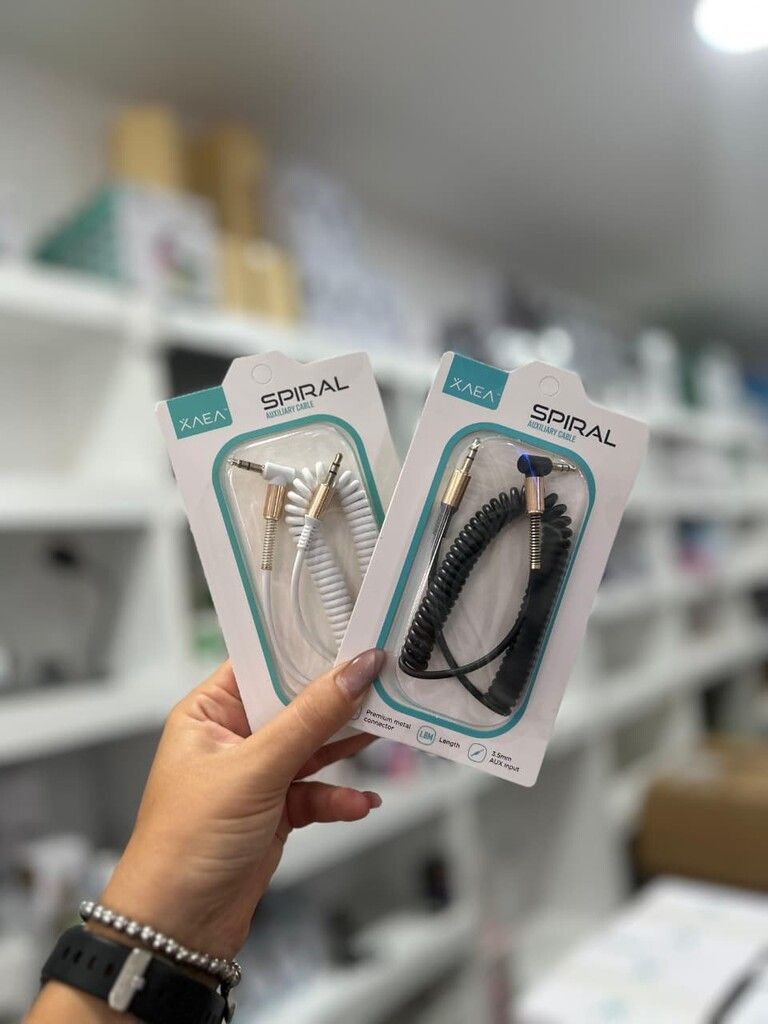 CABLE AUX 3,5 MOD69 - 1,8 METROS - ESPIRAL - BLANCO